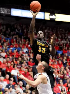 Nov 11, 2013; Tucson, AZ, USA; Long Beach State 49ers forward Nick Shepherd (33) shoots the ball over Arizona Wildcats guard T.J. McConnell (4) during the first half at McKale Center. Mandatory Credit: Casey Sapio-USA TODAY Sports
