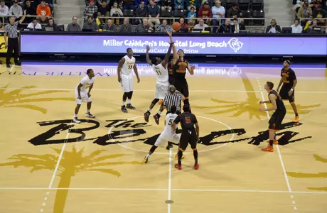 Dec 19, 2013; Long Beach, CA, USA; General view of the opening tipoff between Southern California Trojans center Omar Oraby (55) and 49ers forward David Samuels (11) at Walter Pyramid. Kirby Lee-USA TODAY Sports