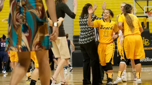 Junior Hallie Meneses had a season-high 17 points in a 73-61 win over Richmond at the Beach Classic.<br><i>(Photo by John Fajardo)</i>