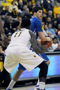 Dec 3, 2013; Long Beach, CA, USA; Creighton Bluejays forward Doug McDermott (3) looks to pass the ball while defended by Long Beach State 49ers forward David Samuels (11) during the first half at Walter Pyramid. Mandatory Credit: Kelvin Kuo-USA TODAY Sports