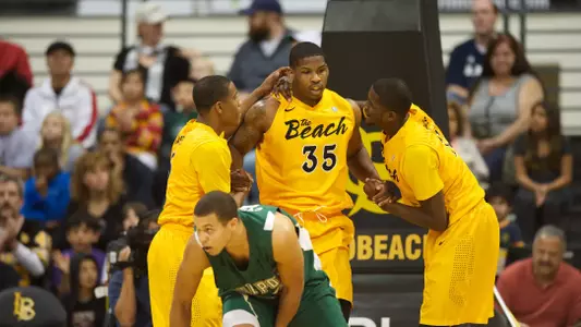 Dan Jennings is helped up in the Big West Conference match against Cal Poly at the Walter Pyramid, Long Beach, Calif., Sat., Feb. 2, 2013.