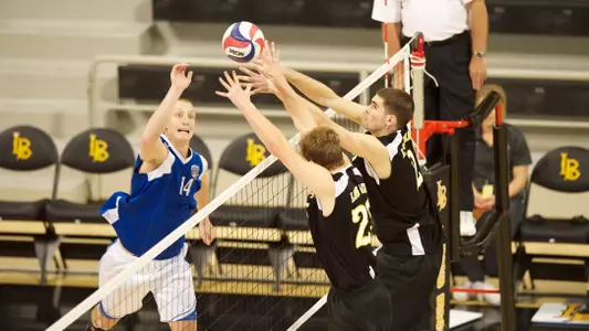 John Henry and Jeff Ornee put up the block against Anthony Randolph in the Active Ankle Tournament match against IPFW at the Walter Pyramid, Long Beach, Calif., Sat. March 16, 2013.
