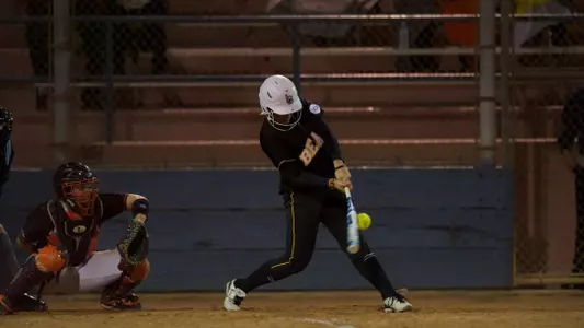 Karli Sandoval makes contact in the Long Beach State Invitational game against Virginia Tech at Mayfair Park, in Lakewood, Calif., Thurs., Mar. 07, 2013.