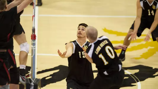 Colten Echave covers the shot in the MPSF Conference Playoff match against Stanford at the Walter Pyramid, Long Beach, Calif., Saturday, April 20, 2013.