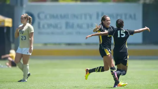 Sophomore Elizabeth Lyons (left) had a goal and an assist in an exhibition game with FIU on Friday.