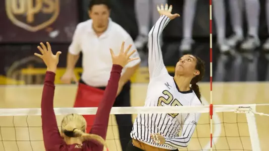 Alex Reid finished with a second straight double-double with 15 kills and 13 digs.