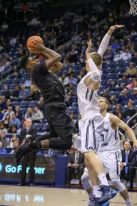 Nov 14, 2014; Provo, UT, USA; Long Beach State 49ers guard Branford Jones (14) dribbles past Brigham Young Cougars guard Chase Fischer (1) during the first half at Marriott Center. Mandatory Credit: Chris Nicoll-USA TODAY Sports