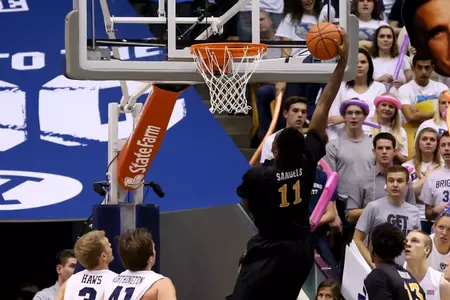 Nov 14, 2014; Provo, UT, USA; Long Beach State 49ers forward David Samuels (11) slams the ball into the basket against the Brigham Young Cougars during the second half at Marriott Center. Brigham Young Cougars won the game 95-90. Mandatory Credit: Chris Nicoll-USA TODAY Sports