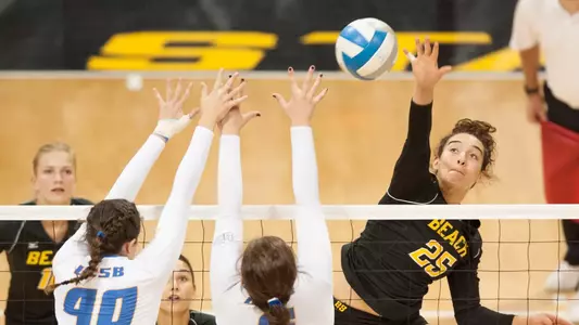 Alex Reid was on fire with 12 kills on .417 hitting.