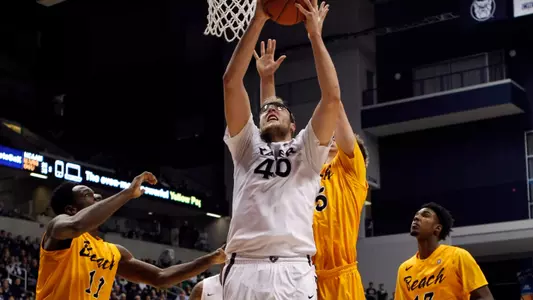 Nov 18, 2014; Cincinnati, OH, USA; Xavier Musketeers center Matt Stainbrook (40) rebounds during the second half against the Long Beach State 49ers forward David Samuels (11) and forward Jack Williams (35) at the Cintas Center. Xavier defeated Long Beach State 97-74. Mandatory Credit: Frank Victores-USA TODAY Sports