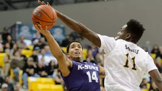 David Samuels blocks a shot by Kansas State Wildcats guard Justin Edwards. Kelvin Kuo-USA TODAY Sports