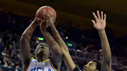 Nov 23, 2014; Los Angeles, CA, USA; UCLA Bruins forward Tony Parker (23) shoots against Long Beach State 49ers forward Eric McKnight (12) during the second half at Pauley Pavilion. Mandatory Credit: Richard Mackson-USA TODAY Sports