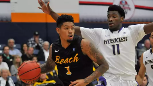 Long Beach State 49ers guard Tyler Lamb (1) moves the ball against Washington Huskies guard Mike Anderson (11) during the second half at Titan Gym. Mandatory Credit: Gary A. Vasquez-USA TODAY Sports