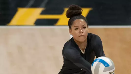 Jackson has over 1,300 career digs.