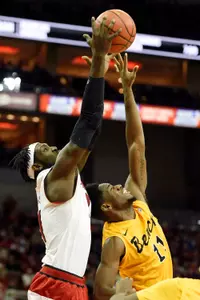Dec 30, 2014; Louisville, KY, USA; Louisville Cardinals forward Montrezl Harrell (24) battles Long Beach State 49ers forward David Samuels (11) for a rebound during the second half at KFC Yum! Center. Louisvile defeated Long Beach State 63-48.  Mandatory Credit: Jamie Rhodes-USA TODAY Sports