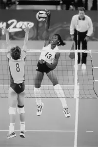 Cross-Battle played in four Olympic Games, including the Sydney Games (pictured here).