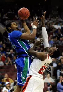 Mar 24, 2013; Philadelphia, PA, USA; Florida Gulf Coast forward Eric McKnight (12) shoots against San Diego State forward DeShawn Stephens (23) in the second half during the third round of the NCAA basketball tournament at Wells Fargo Center. Mandatory Credit: Eileen Blass-USA TODAY Sports