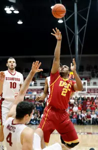 Feb 20, 2014; Stanford, CA, USA; USC Trojans forward Roschon Prince (2) shoots over Stanford Cardinal center Stefan Nastic (4) during the first half at Maples Pavilion. Mandatory Credit: Bob Stanton-USA TODAY Sports