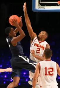 Nov 30, 2013; Paradise Island, BAHAMAS; Xavier Musketeers guard Semaj Christon (0) shoots over USC Trojans forward Roschon Prince (2) during the second half at the 2013 Battle 4 Atlantis in the Imperial Arena at the Atlantis Resort. Mandatory Credit: Kevin Jairaj-USA TODAY Sports