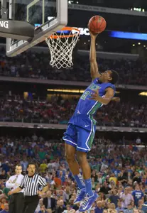 Mar 29, 2013; Arlington, TX, USA; Florida Gulf Coast Eagles forward Eric McKnight (12) lays the ball up against the Florida Gators in the first half during the semifinals of the South regional of the 2013 NCAA Tournament at Cowboys Stadium. Mandatory Credit: Matthew Emmons-USA TODAY Sports