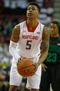 Jan 15, 2014; College Park, MD, USA; Maryland Terrapins guard Nick Faust (5) shoots a free throw against the Notre Dame Fighting Irish at Comcast Center. Mandatory Credit: Mitch Stringer-USA TODAY Sports