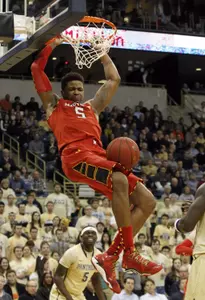 Jan 6, 2014; Pittsburgh, PA, USA; Maryland Terrapins guard Nick Faust (5) dunks the ball against the Pittsburgh Panthers during the second half at the Petersen Events Center. Pittsburgh won 79-59. Mandatory Credit: Charles LeClaire-USA TODAY Sports