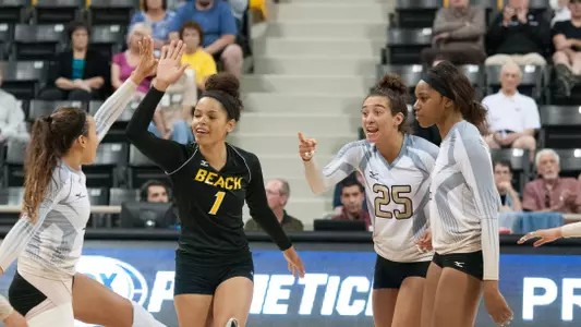 The team celebrates a point.