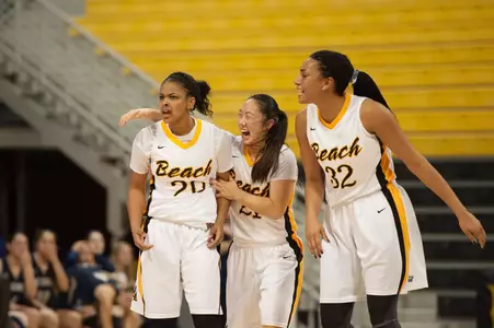 LBSU celebrates after Raven Benton makes the game-winning basket.