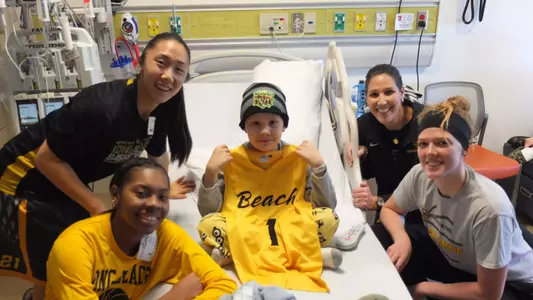 Members of the Long Beach State women's basketball team visited Miller Children's Hospital on Friday.