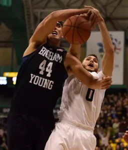 Nov 16, 2015; Long Beach, CA, USA; Long Beach State 49ers forward Gabe Levin (right) battles with Brigham Young Cougars center Corbin Kaufusi (44) for a rebound during the second half at The Pyramid. The Long Beach State 49ers won 66-65. Mandatory Credit: Kelvin Kuo-USA TODAY Sports
