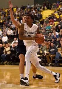 Nov 16, 2015; Long Beach, CA, USA; Long Beach State 49ers hard Nick Faust moves the ball during the second half against the Brigham Young Cougars at The Pyramid. The Long Beach State 49ers won 66-65. Mandatory Credit: Kelvin Kuo-USA TODAY Sports
