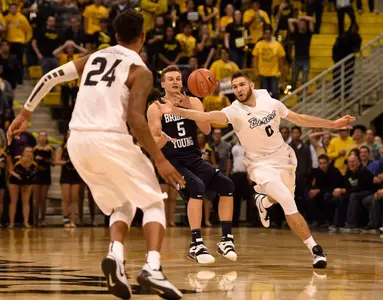 Nov 16, 2015; Long Beach, CA, USA; Long Beach State 49ers forward Gabe Levin (right) blocks an inbound pass from Brigham Young Cougars guard Kyle Collinsworth (center) during the second half at The Pyramid. The Long Beach State 49ers won 66-65. Mandatory Credit: Kelvin Kuo-USA TODAY Sports
