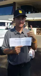 Junior Jonny Hogan with his bogey-free career-low 65 scorecard at the Ka'anapali Classic Collegiate Invitational. (Photos by John Wurzer/LBSU)