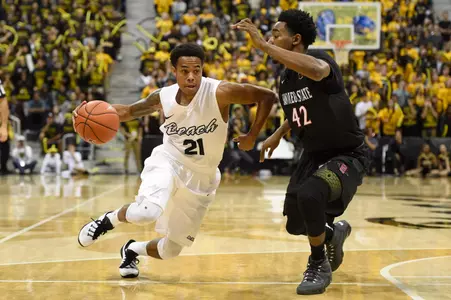 Dec 1, 2015; Long Beach, CA, USA; Long Beach State 49ers guard Justin Bibbins (21) dribbles the ball as San Diego State Aztecs guard Jeremy Hemsley (42) defends during the second half at The Pyramid. The Aztecs won 76-72. Mandatory Credit: Kelvin Kuo-USA TODAY Sports
