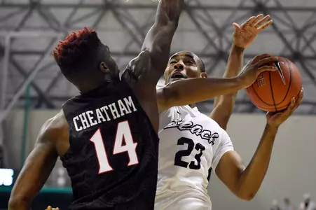 Dec 1, 2015; Long Beach, CA, USA; Long Beach State 49ers Roschon Prince (23) shoots the ball as San Diego State Aztecs Zylan Cheatham (14) defends during the second half at The Pyramid. The Aztecs won 76-72. Mandatory Credit: Kelvin Kuo-USA TODAY Sports