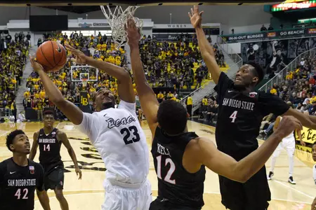 Dec 1, 2015; Long Beach, CA, USA; Long Beach State 49ers Roschon Prince (23) shoots the ball as San Diego State Aztecs guard Trey Kell (12) defends during the second half at The Pyramid. The Aztecs won 76-72. Mandatory Credit: Kelvin Kuo-USA TODAY Sports