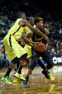 Oregon Ducks forward Elgin Cook (23) steals the ball away from Long Beach State 49ers forward Travis Hammonds. USA TODAY Sports