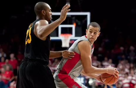 Arizona Wildcats forward Ryan Anderson looks to pass around 49ers forward Roschon Prince during the second half at McKale Center. Credit: Casey Sapio-USA TODAY Sports