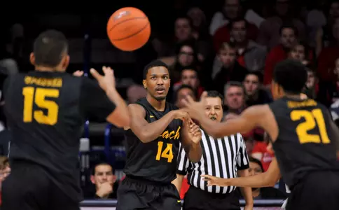 49ers guard Branford Jones passes to guard A.J. Spencer during the second half against the Arizona Wildcats at McKale Center. Credit: Casey Sapio-USA TODAY Sports