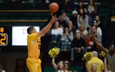 Dec 3, 2015; Fort Collins, CO, USA; Long Beach State 49ers guard A.J. Spencer (15) attempts a three point basket. Credit: Ron Chenoy-USA TODAY Sports