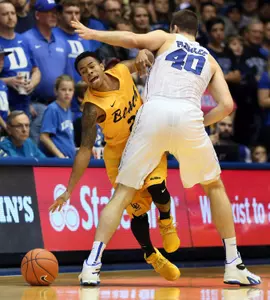 Dec 30, 2015; Durham, NC, USA; Long Beach State 49ers guard Justin Bibbins (21) collides with Duke Blue Devils center Marshall Plumlee (40) as he dribbles the ball. Credit: Mark Dolejs-USA TODAY Sports