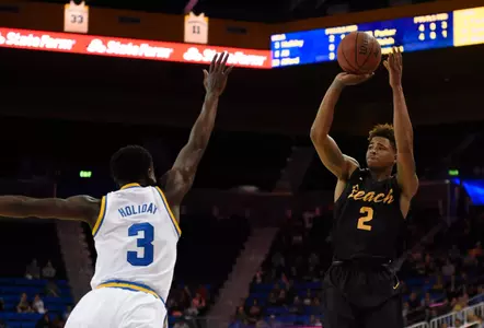 49ers guard Nick Faust shoots over UCLA Bruins guard Aaron Holiday during the game at Pauley Pavilion. Credit: Richard Mackson-USA TODAY Sports
