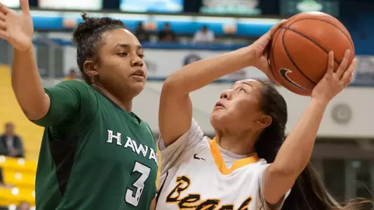 Senior Hallie Meneses finished with a game-high 19 points in a loss to Hawai'i. (Photo by John Fajardo)
