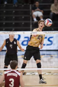 Sophomore Eric Ensing had a career-high 11 kills in a 3-0 win over Harvard on the first day of the Asics Tournament.<br><i>(Photo by John Fajardo)</i>