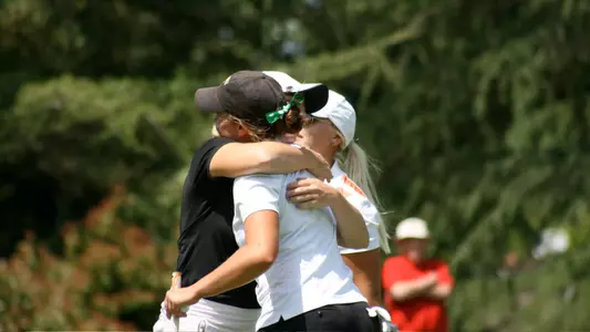 Kassidy Teare with Madison Hirsch of Cal Poly.  (Photo by Cameron Fujimoto/LBSU)