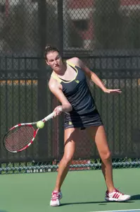 Laura Eales won at singles and doubles to help the Beach advance.