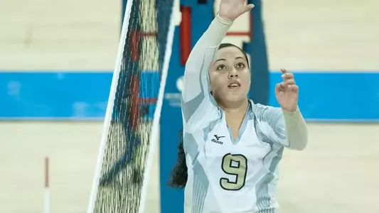 Jenelle Hudson leads the current team against the alunmae on Saturday.