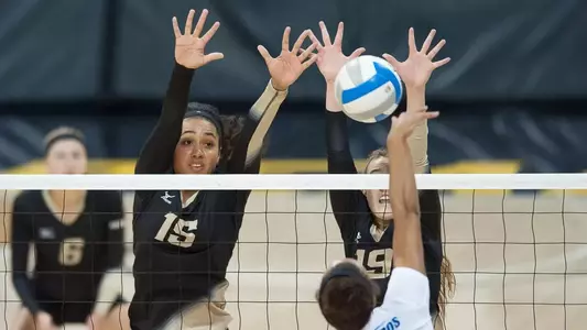 Ashley Murray had 13 kills and 8 blocks Friday morning, part of 15 team blocks for the Beach.