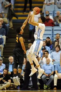 North Carolina Tar Heels forward Justin Jackson (44) shoots over Long Beach State 49ers guard Anson Moye (20) during the first half at Dean E. Smith Center. Evan Pike-USA TODAY Sports