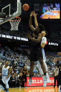 North Carolina Tar Heels forward Justin Jackson (44) defends Long Beach State 49ers forward Mason Riggins (5) during the first half at Dean E. Smith Center. Evan Pike-USA TODAY Sports